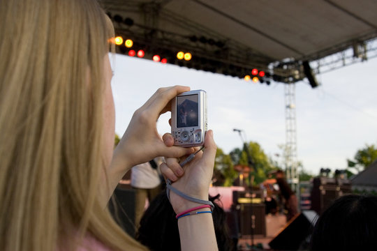 taking photo at the concert