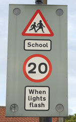 school sign when lights flash speed limit 20 mph