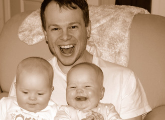 happy father with twins