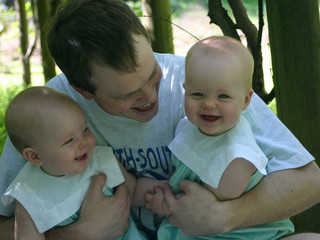 proud daddy with twins