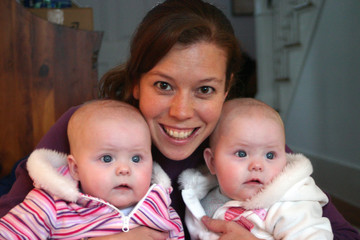 young mother with twin girls