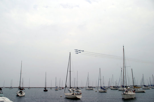 sailboats with plane formation