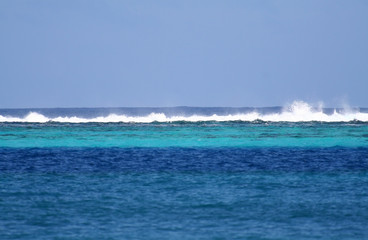 blue lagoon and reef waves