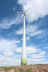 Fototapeta na wymiar wind turbine and blue sky