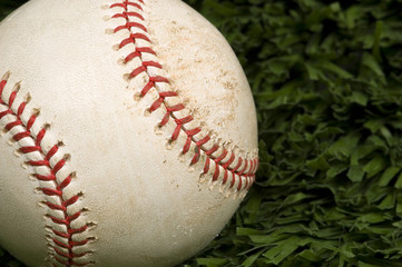 baseball on grass close up
