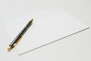 pen and blank envelope