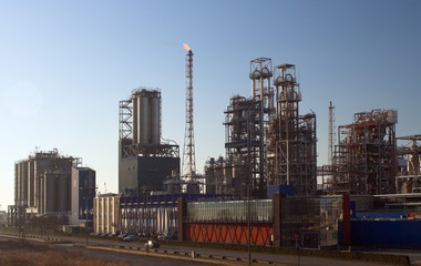 oil refinery before sunset