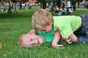Naklejka na ściany i meble children play in grass