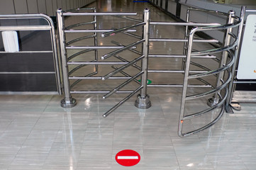 stop sign before entrance gate