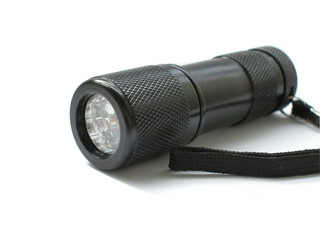 metallic electric torch isolated on a white backgr