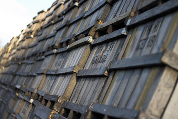 long line of old wooden fruit crates