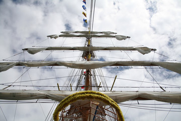 boat mast with furled sails