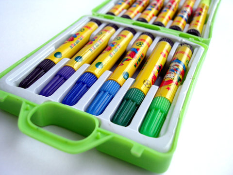 color soft-tip pens in a small box