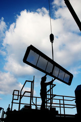 worker with screen silhouetteh