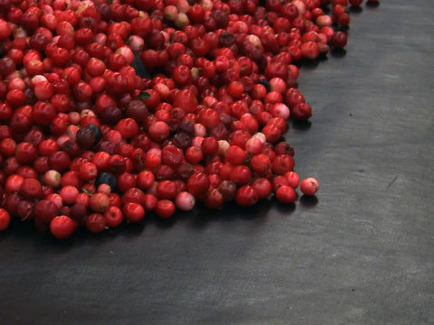red blobs on black background