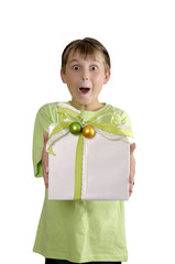 excited boy holding a wrapped present