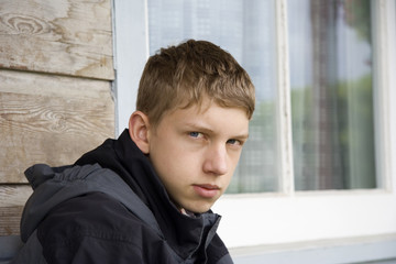 teenager staring into space