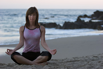Fototapeta na wymiar yoga on the beach 4