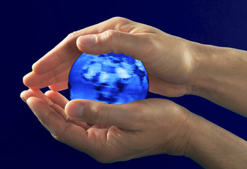 the earth in the hands