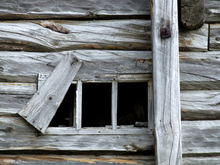 old small window in wooden house