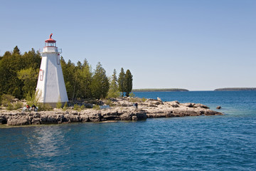 tobermory view from boat to island and lighthouse