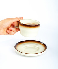 holding the coffee cup