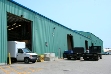 factory with trucks