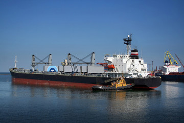 the ship and  tugboat