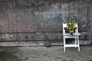 Fototapeta na wymiar chair & sunflowers