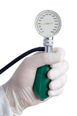 hand holding a device for measuring blood pressure