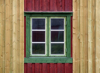 Fototapeta na wymiar window on a colorful wall
