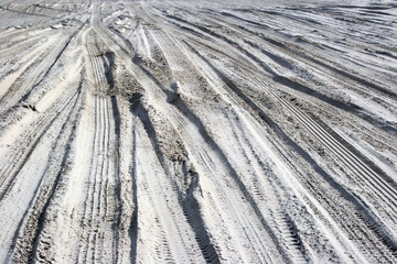 tire tracks in the sand