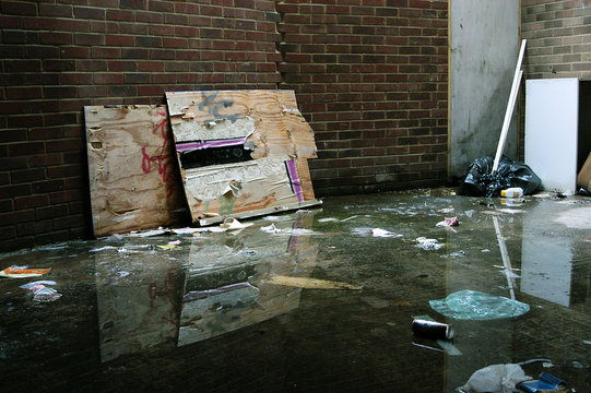 trash in flooded alley