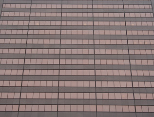 Fototapeta na wymiar skyscraper windows background