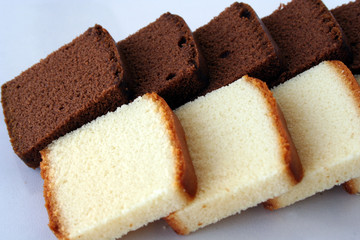 isolated chocolate  & vanilla cake in line