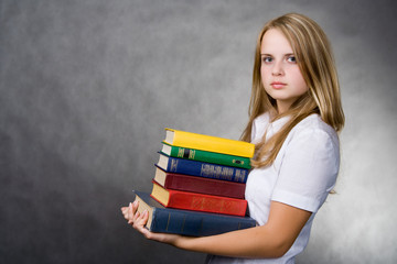 girl carrying books
