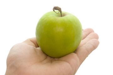 green apple in palm