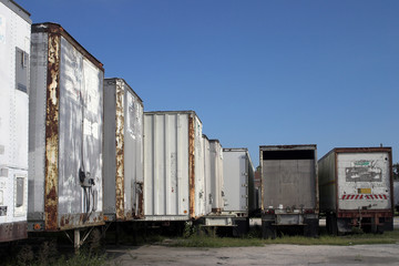 derelict tractor trailers in a row