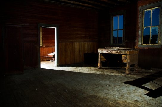 Empty dark interior of abandoned house