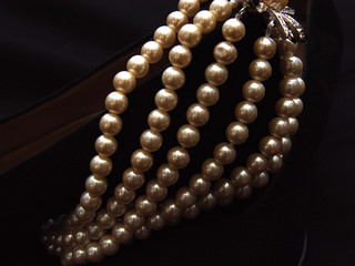 closeup pearls on suede