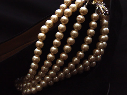 closeup pearls on suede