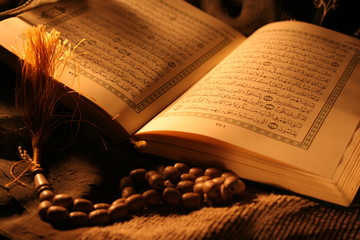 holy koran with wood rosary
