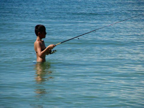 Fishing In Waist Deep Water