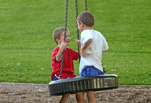 Boy On Tire Swing