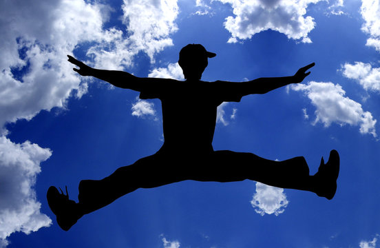 jumping boy - blue sky
