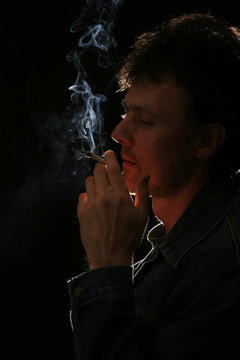 man smoking cigarette