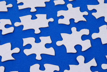 puzzle pieces on blue