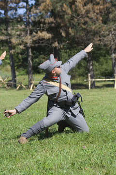 soldier launching a grenade