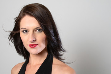 windy dark hair woman