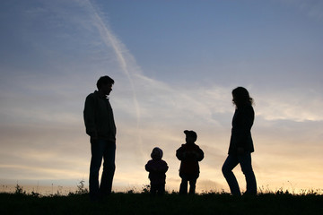 Fototapeta na wymiar silhouette family of four
